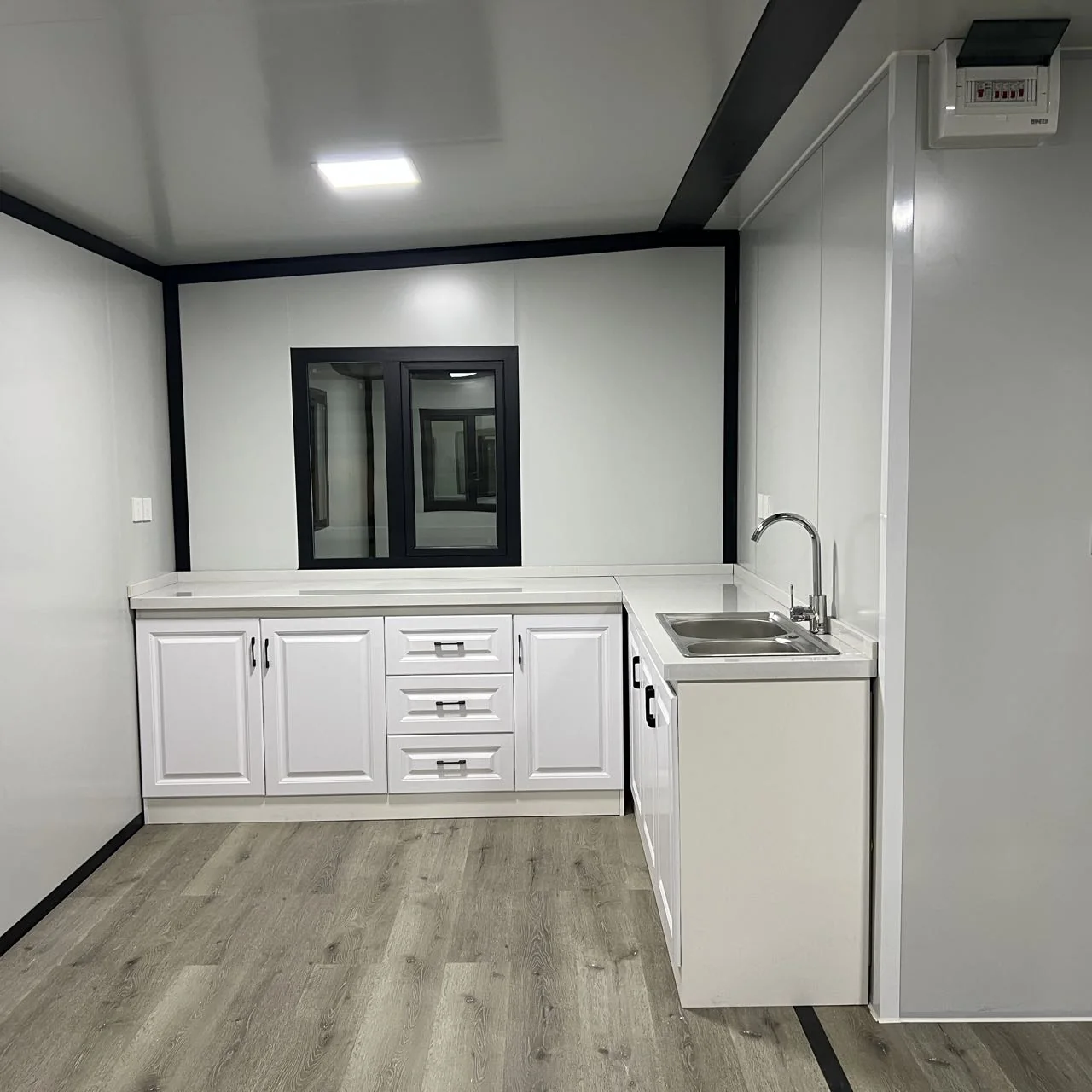 Reference kitchen counter and cabinets.